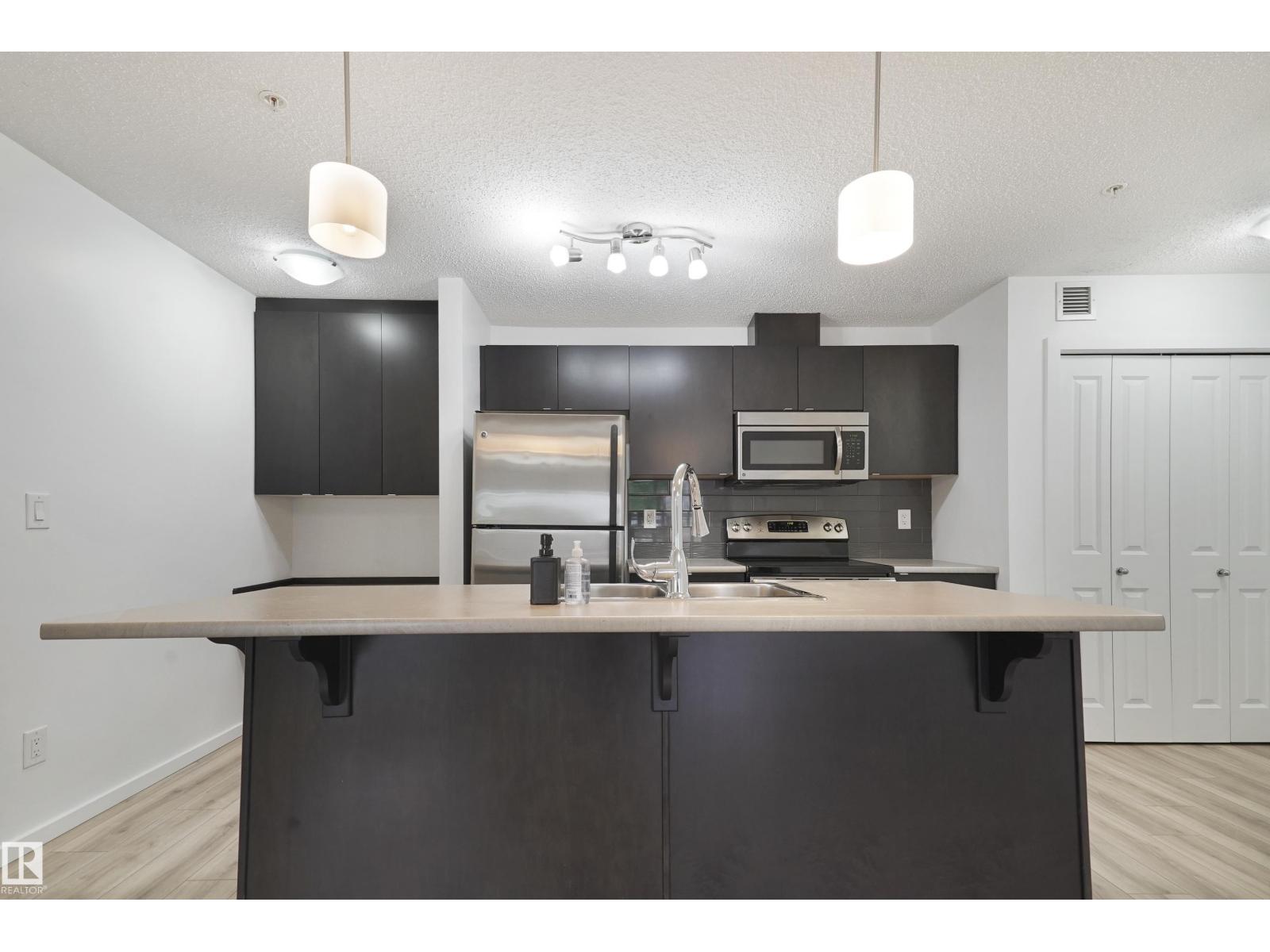 #114 3357 16A AV NW - 38