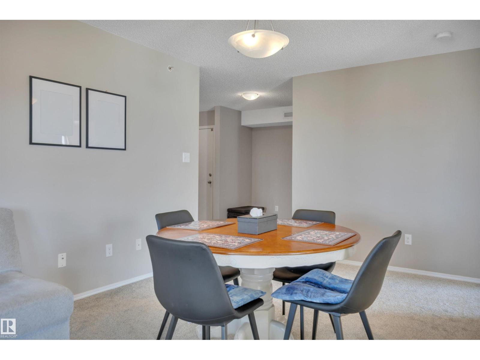 #402 11812 22 AV SW - 9