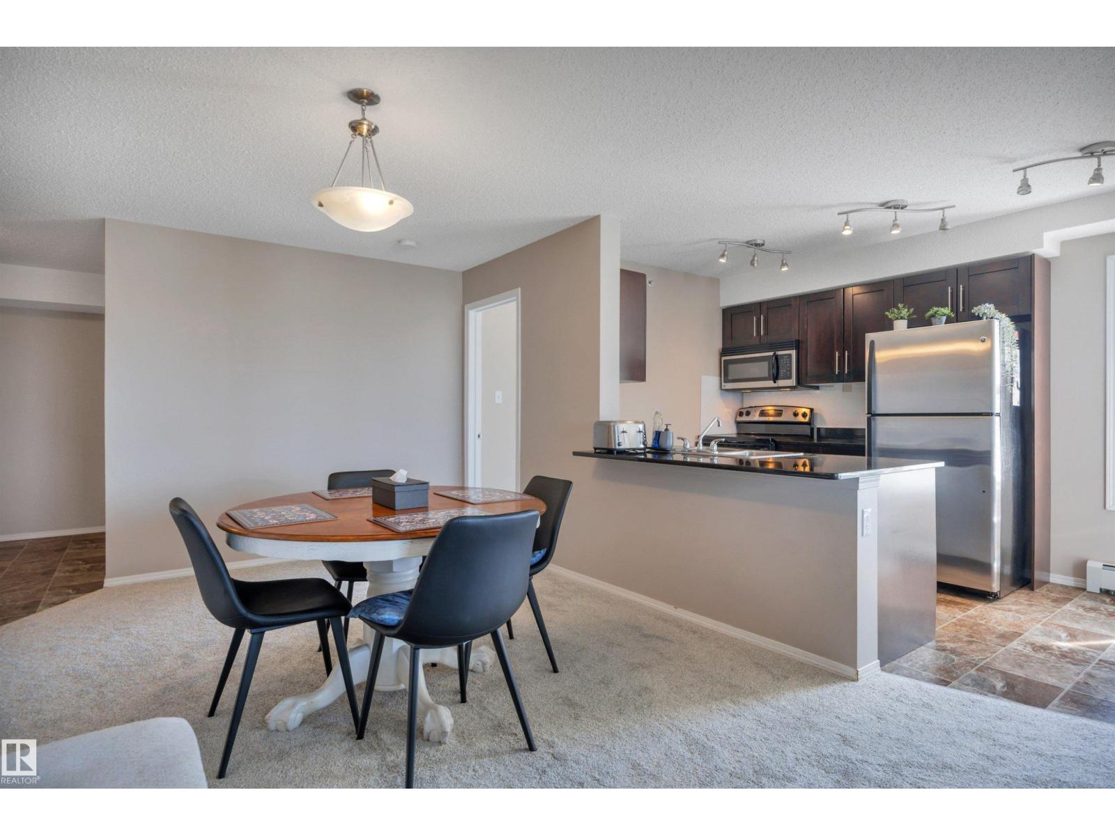 #402 11812 22 AV SW - 10