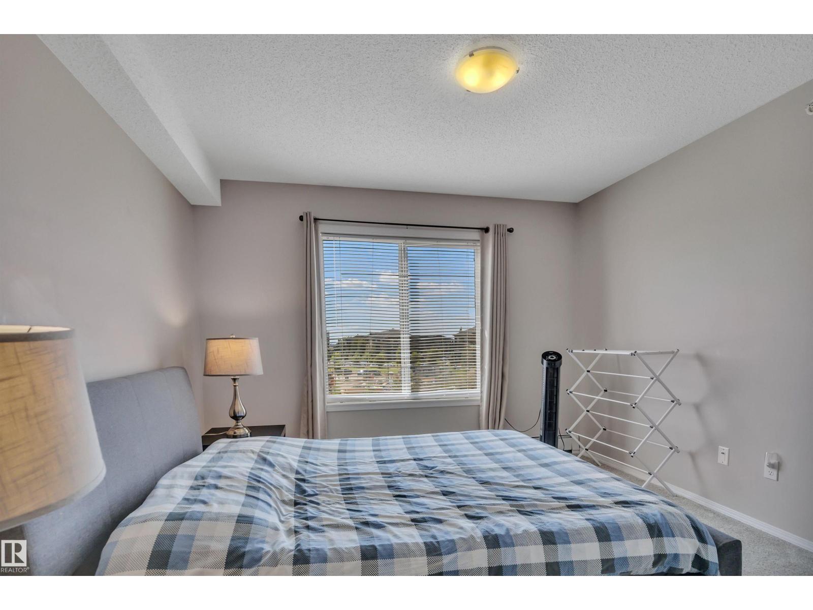 #402 11812 22 AV SW - 23
