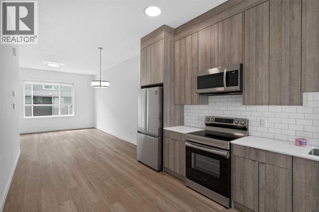 #202 101 Panatella Square NW - 2