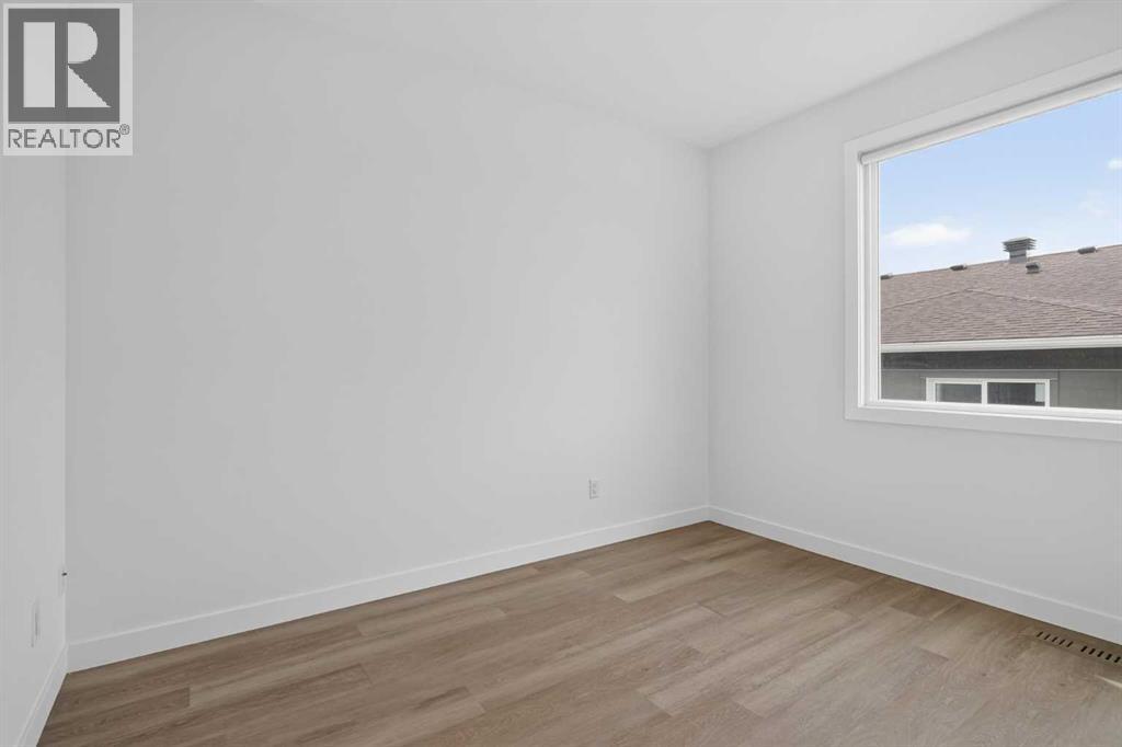 #202 101 Panatella Square NW - 15