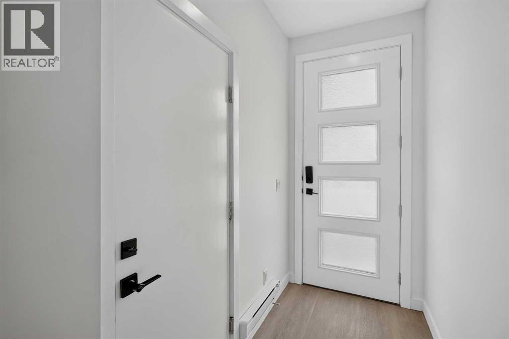 #202 101 Panatella Square NW - 3