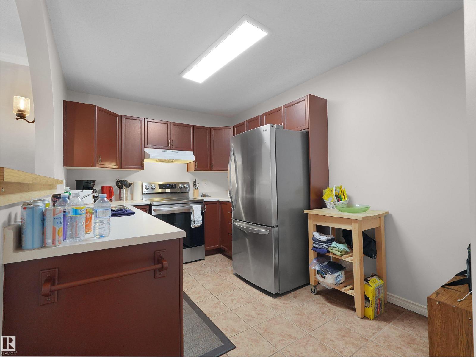 #228 15499 CASTLE DOWNS RD NW - 26