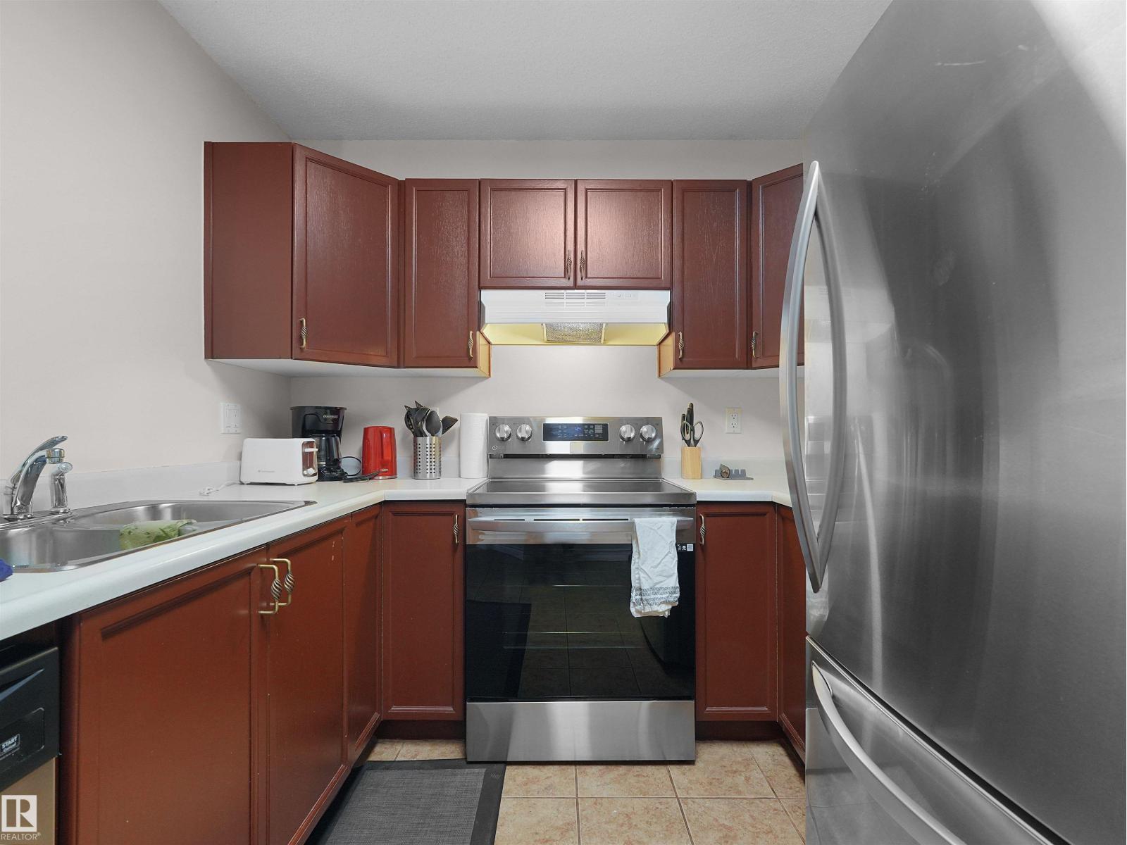 #228 15499 CASTLE DOWNS RD NW - 27