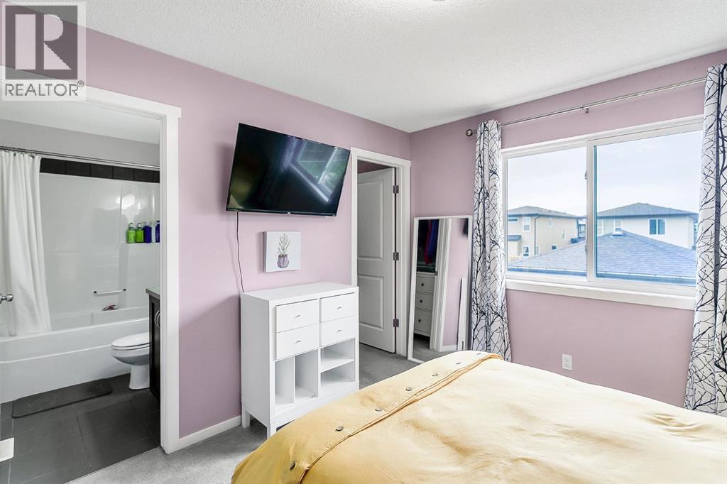 2nd bedroom with 4 pce bathroom and walk in closet