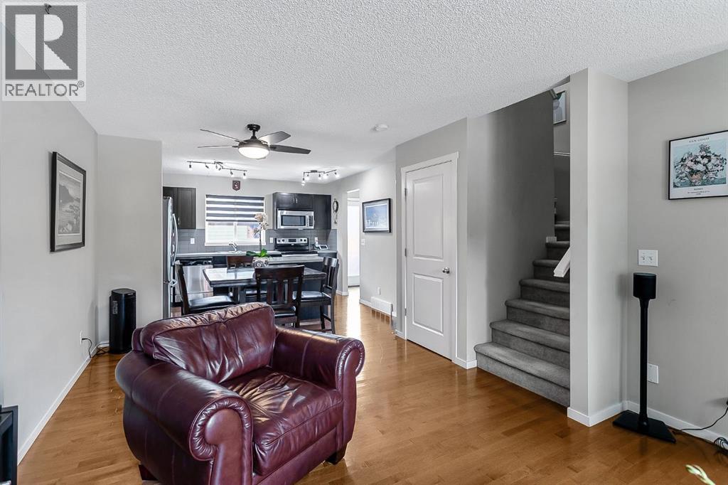 Living room open to dining room and kitchen