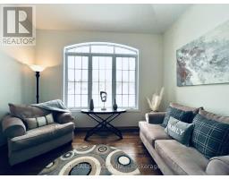 Living room - 461 John Aselford Drive, Ottawa, ON K2W1A8 Photo 11