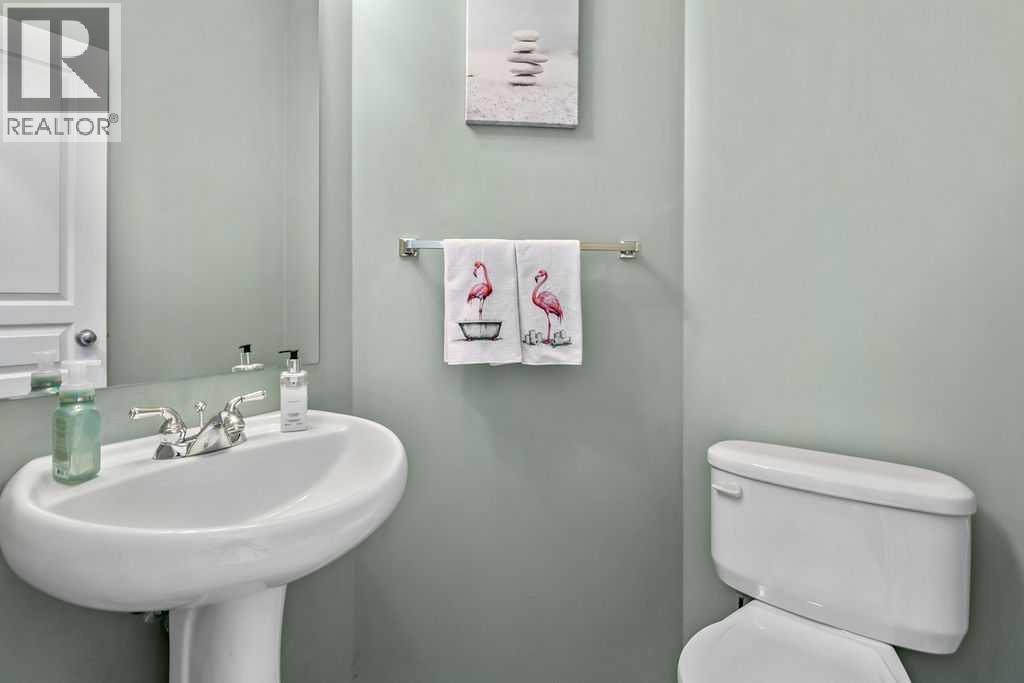 Conveniently located 2-piece powder room for family and guests