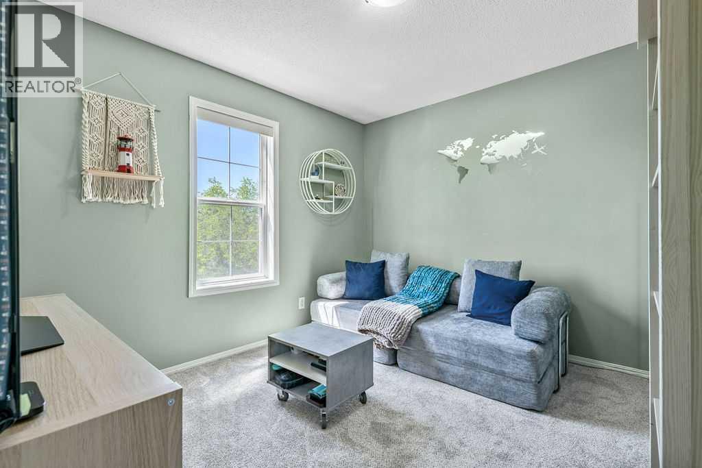 A versatile bedroom with ample natural light and closet space to suit a variety of needs