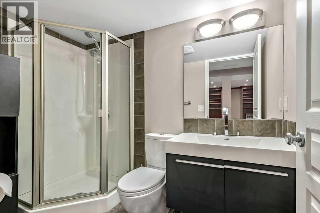 A stylishly updated 3-piece bathroom adds convenience for guests and the lower-level bedroom