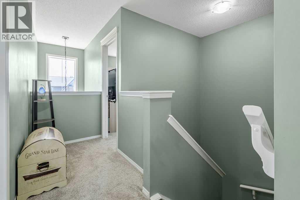 A functional upper-level layout keeps the bedrooms connected while offering separation from the main living spaces below