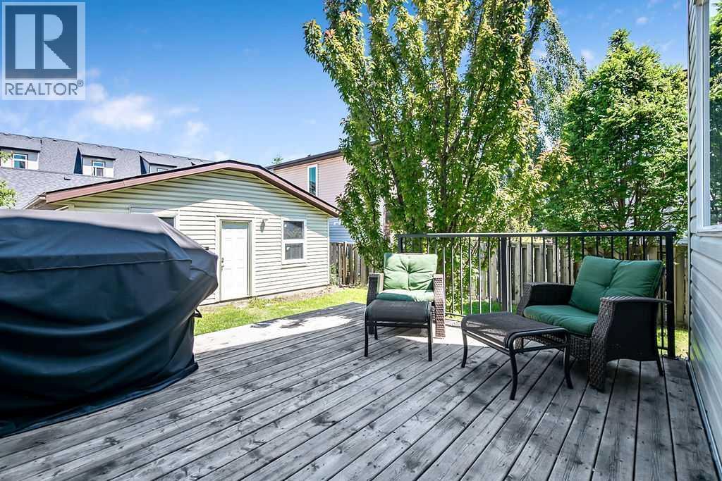 Mature trees and established landscaping create a private backyard with room for kids, pets, and outdoor enjoyment
