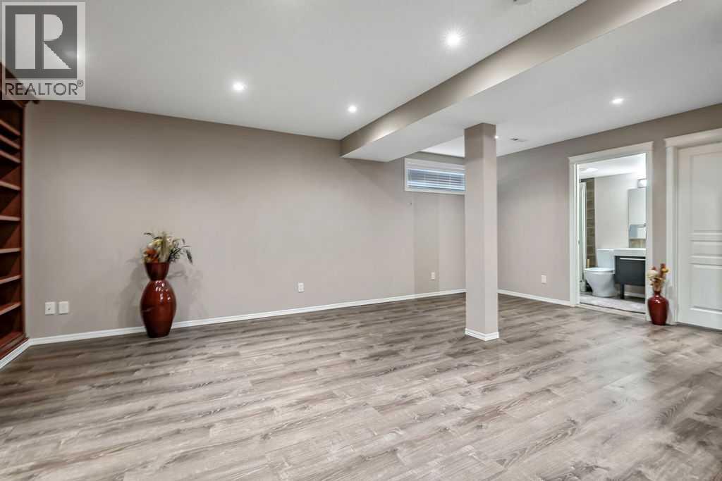 An expansive recreation room offers endless flexibility for movie nights, games, entertaining, or everyday family living
