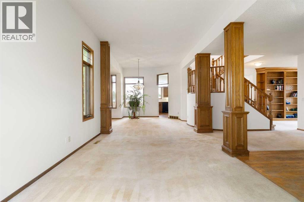 You can see the office with custom built-ins to the right
