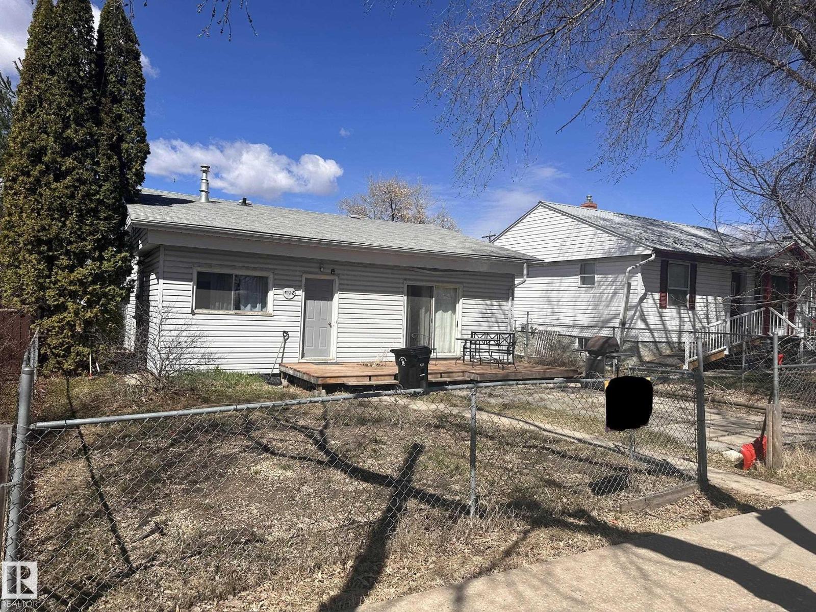 5128 52 ST - 66