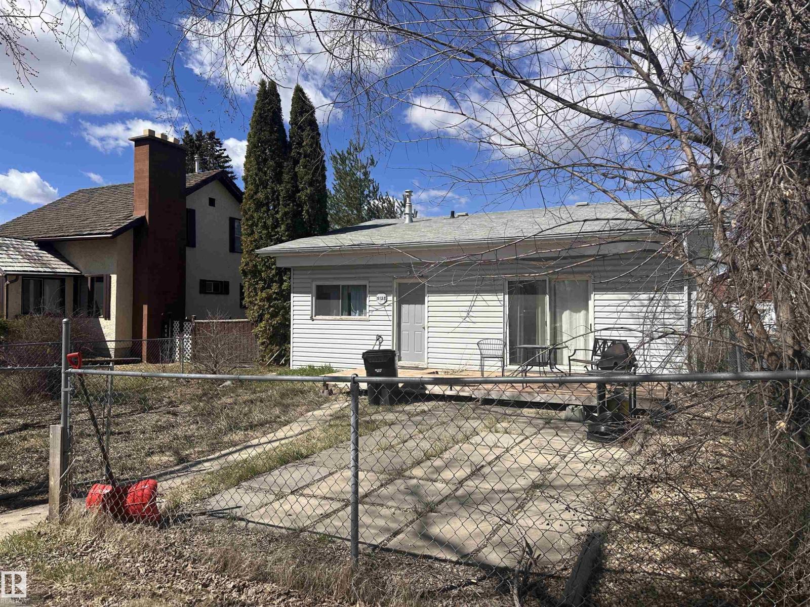 5128 52 ST - 65