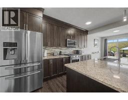 Laundry room - 53 Fireside Crescent, Cochrane, AB T4C2L4 Photo 9