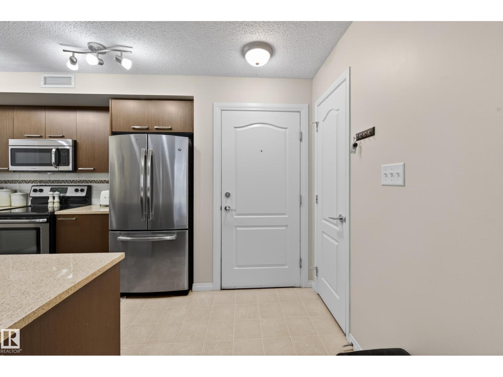 #2402 7343 SOUTH TERWILLEGAR DR NW - 21