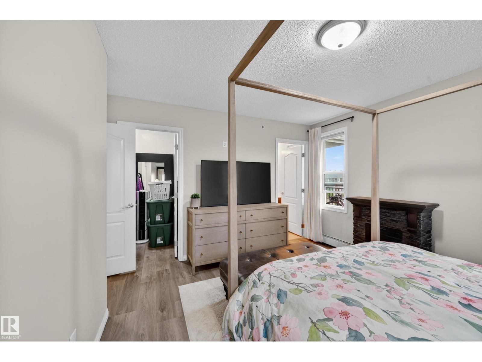 #2402 7343 SOUTH TERWILLEGAR DR NW - 48