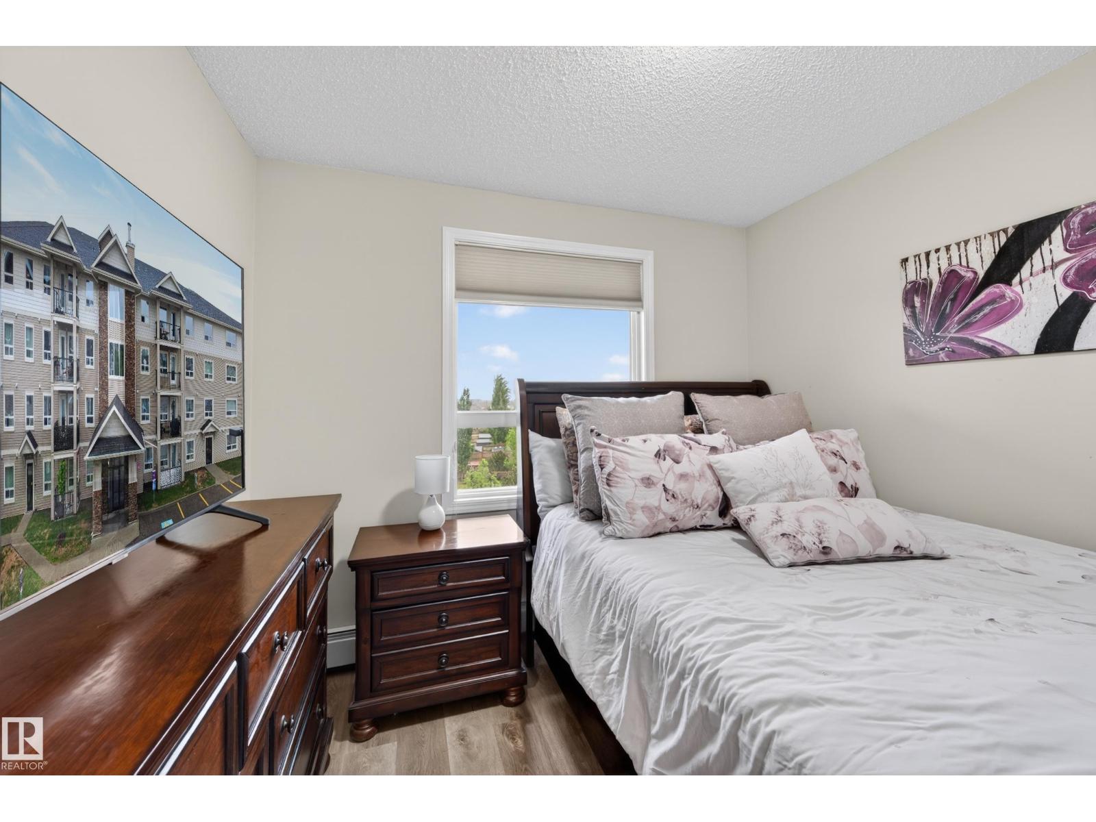 #2402 7343 SOUTH TERWILLEGAR DR NW - 51
