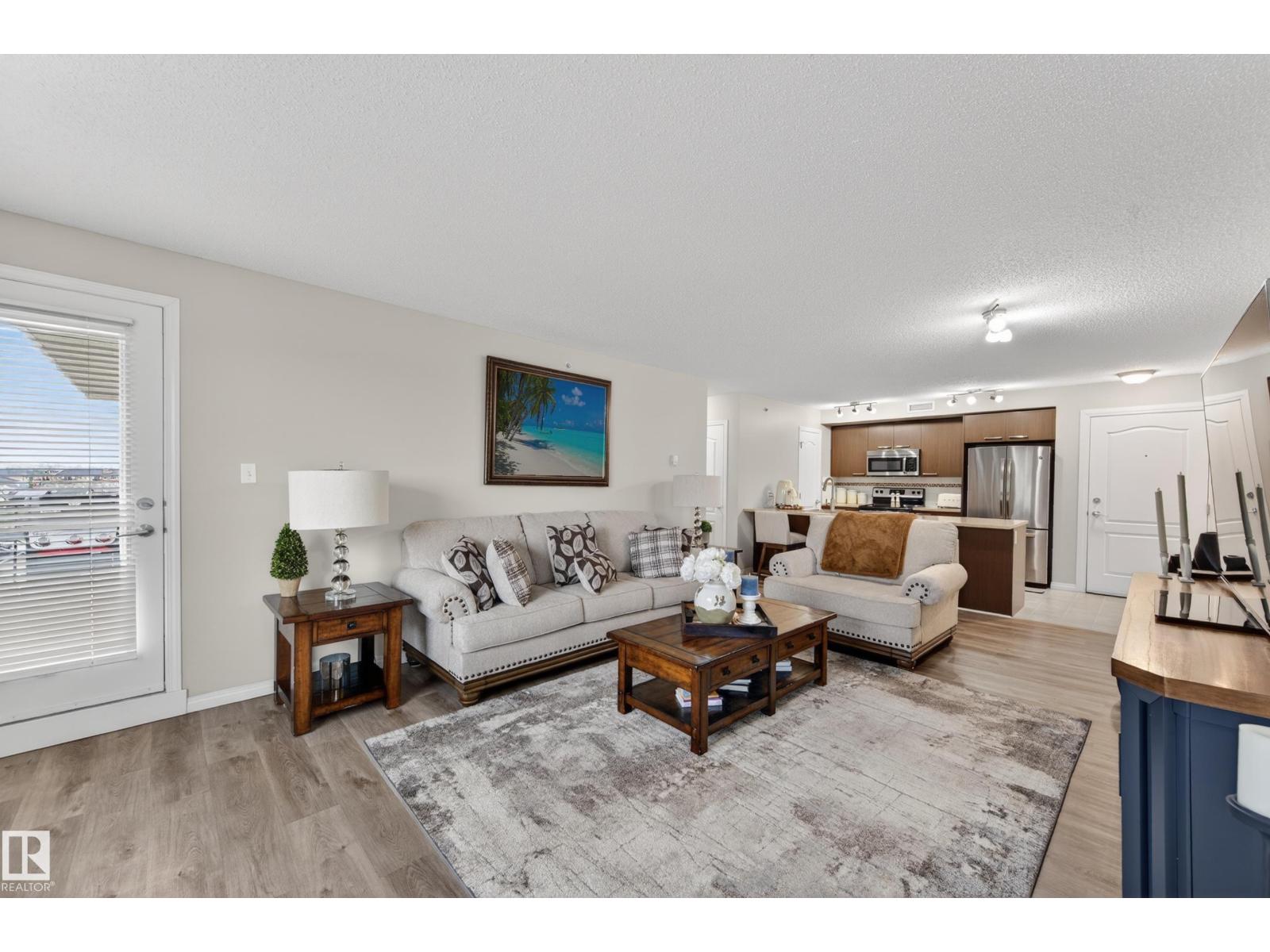 #2402 7343 SOUTH TERWILLEGAR DR NW - 38