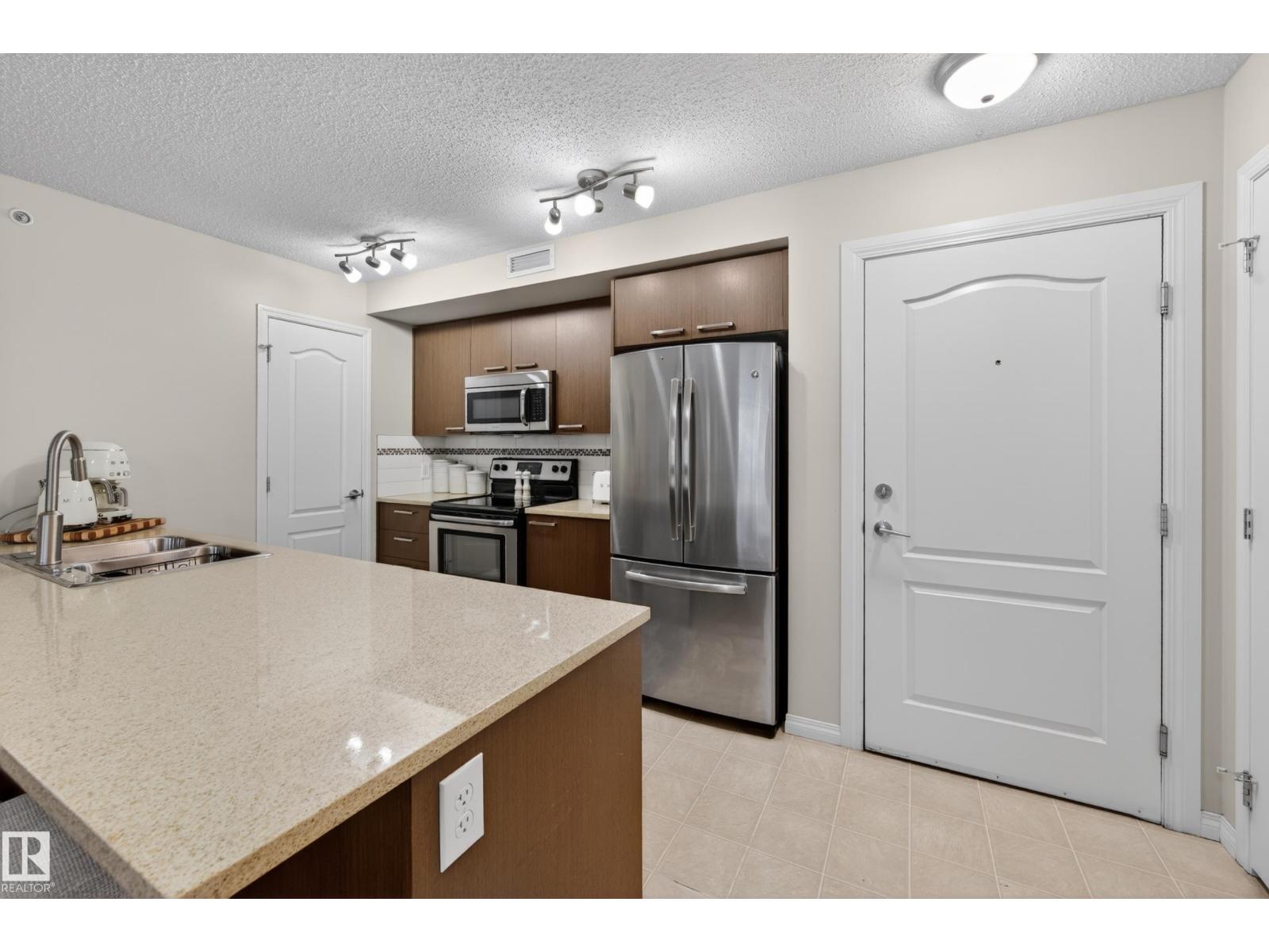 #2402 7343 SOUTH TERWILLEGAR DR NW - 22
