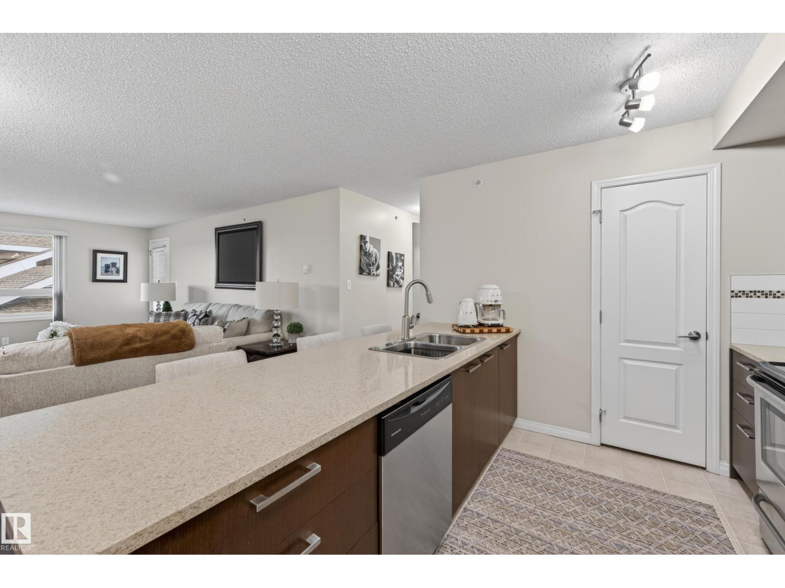#2402 7343 SOUTH TERWILLEGAR DR NW - 26