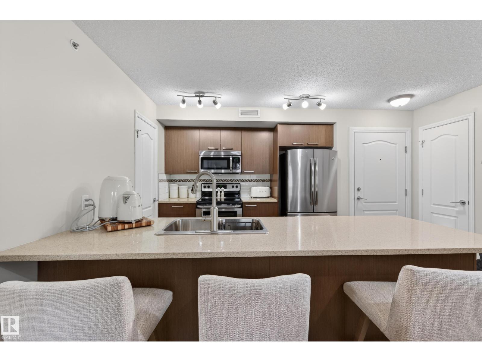 #2402 7343 SOUTH TERWILLEGAR DR NW - 27