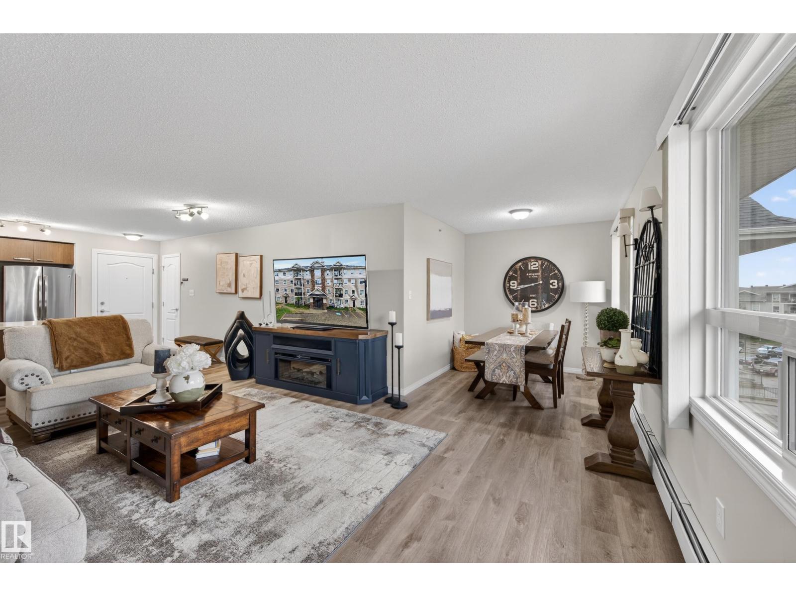 #2402 7343 SOUTH TERWILLEGAR DR NW - 33