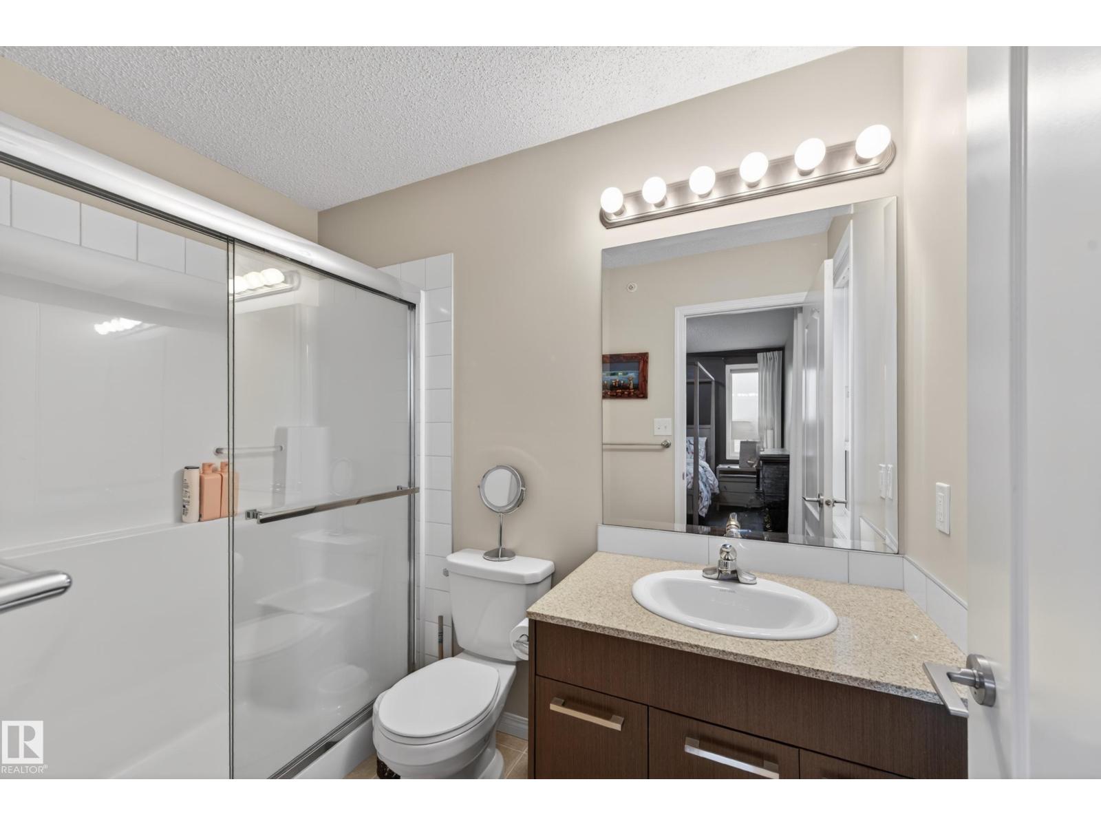 #2402 7343 SOUTH TERWILLEGAR DR NW - 46