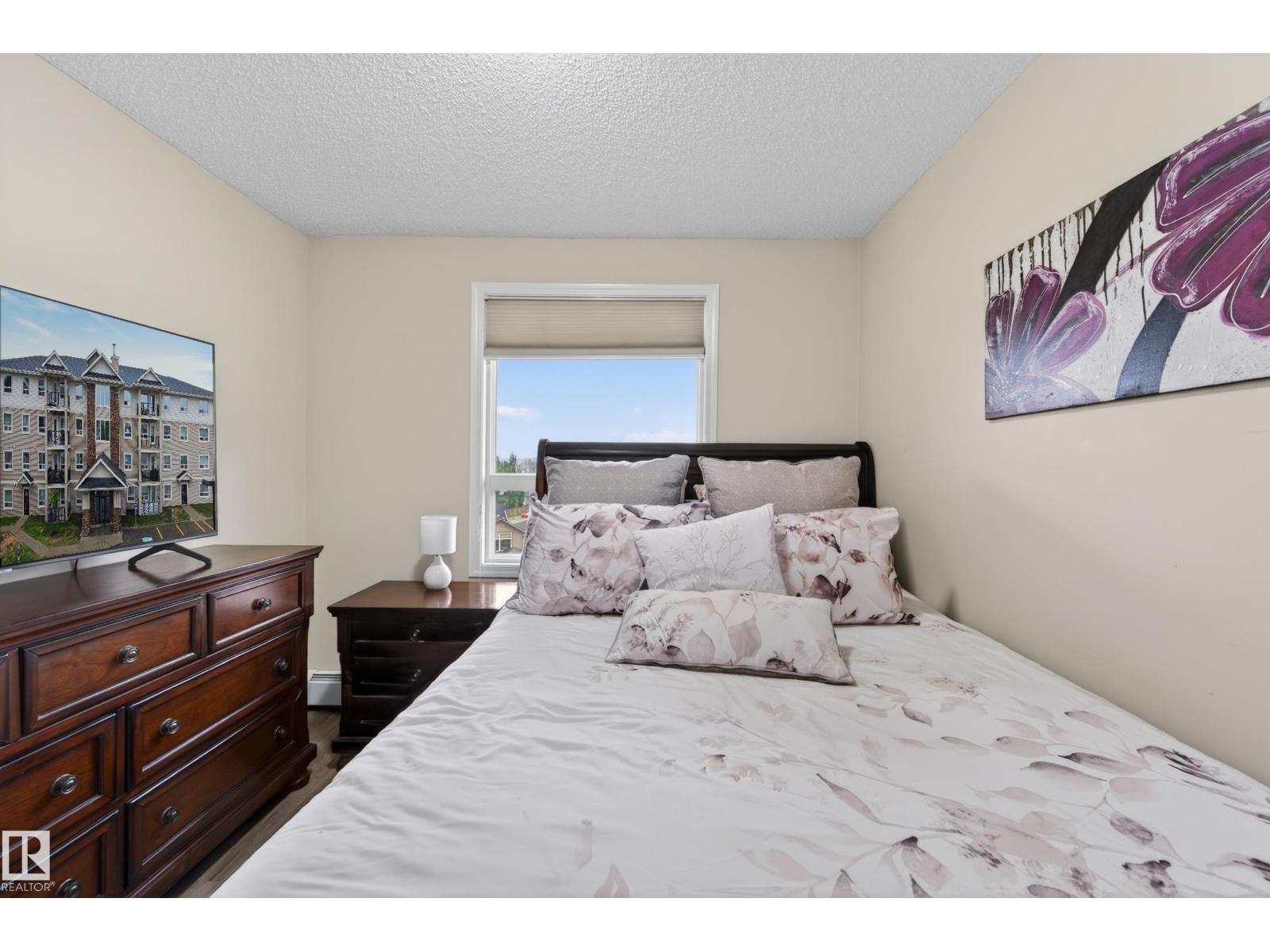#2402 7343 SOUTH TERWILLEGAR DR NW - 52