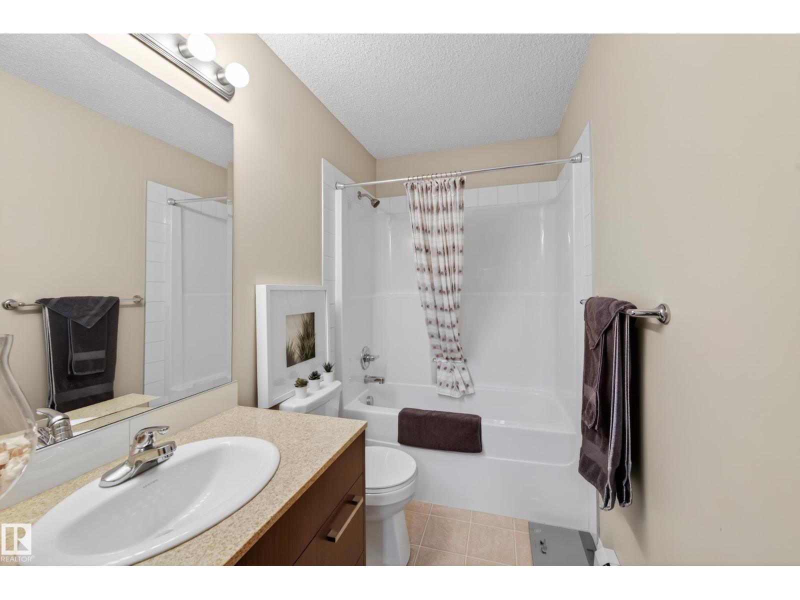 #2402 7343 SOUTH TERWILLEGAR DR NW - 42