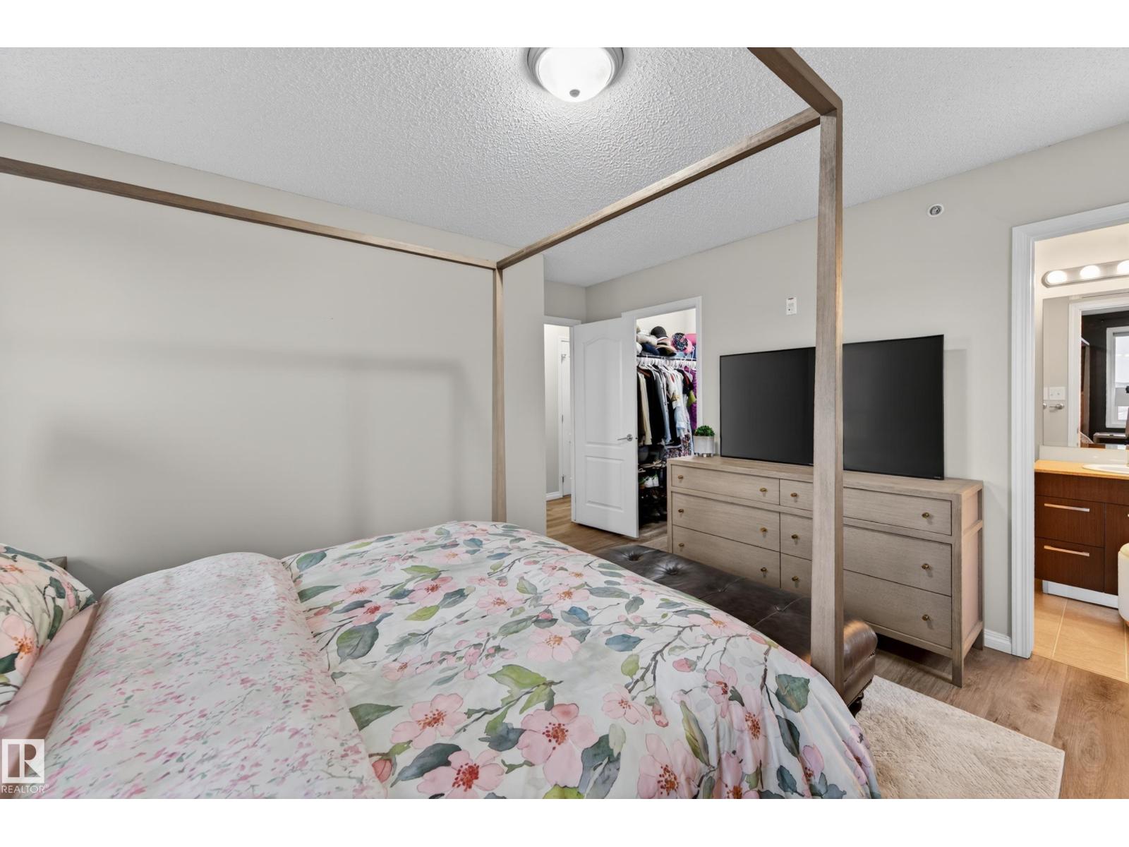 #2402 7343 SOUTH TERWILLEGAR DR NW - 47