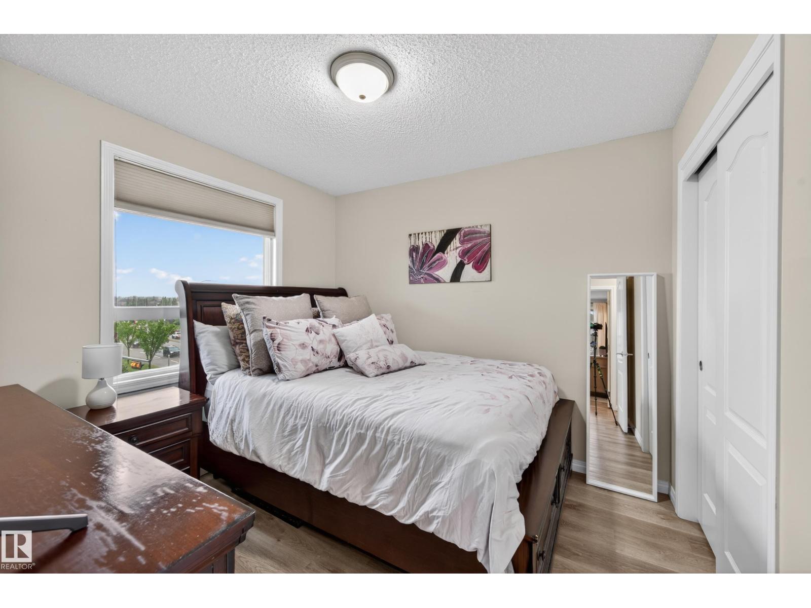 #2402 7343 SOUTH TERWILLEGAR DR NW - 50