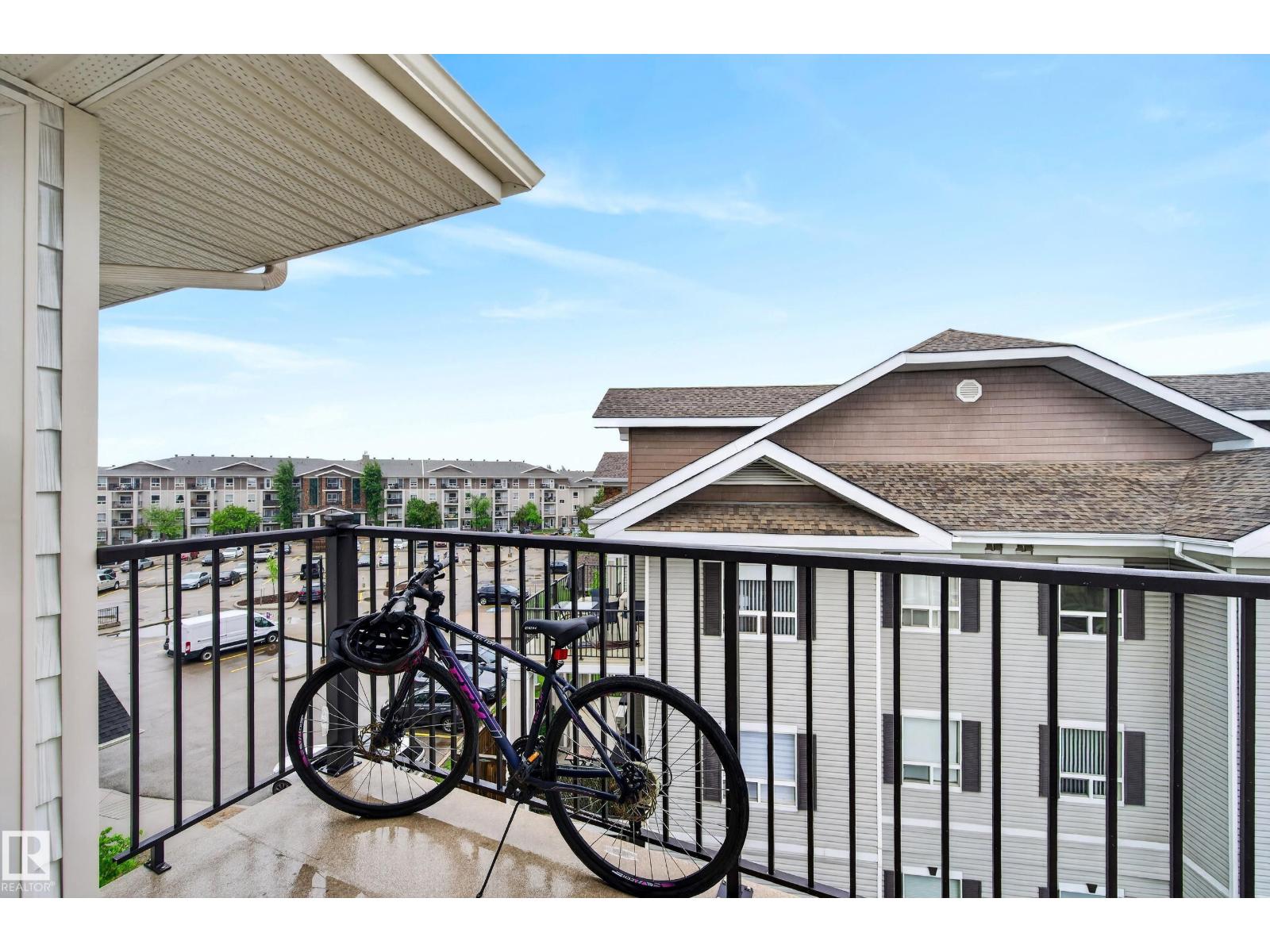 #2402 7343 SOUTH TERWILLEGAR DR NW - 55