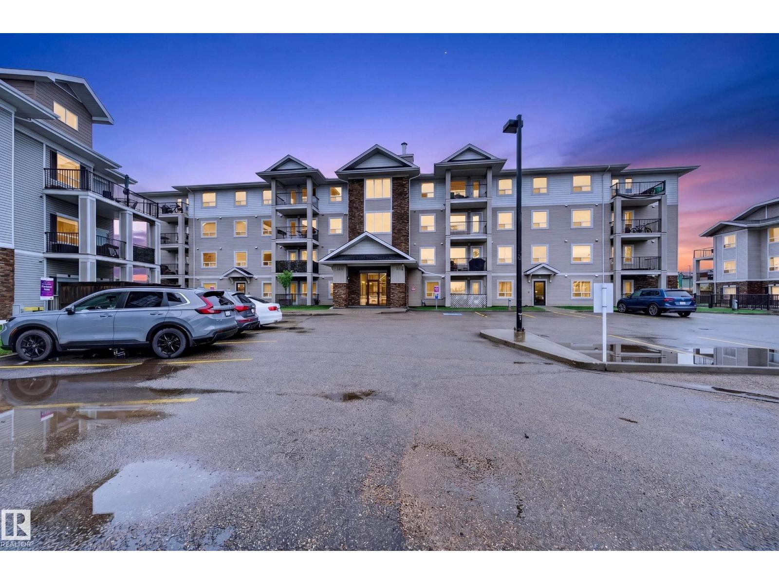 #2402 7343 SOUTH TERWILLEGAR DR NW - 1