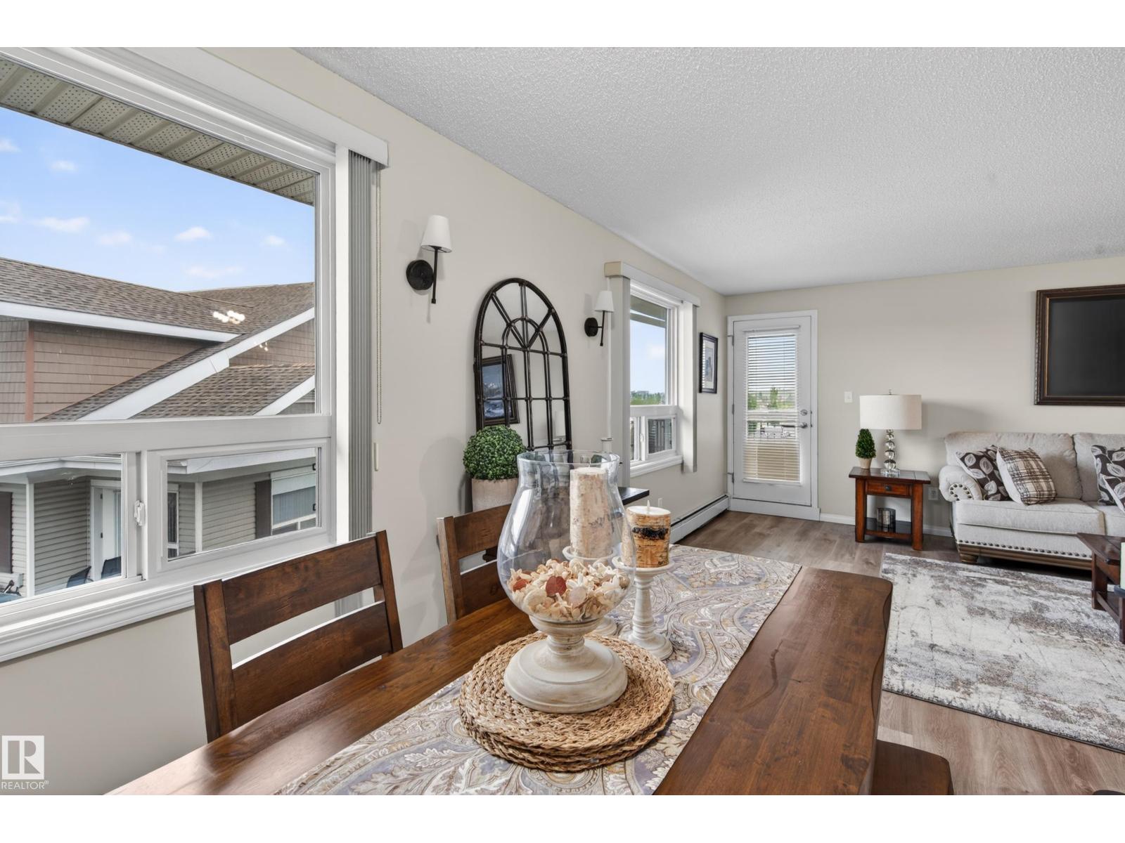 #2402 7343 SOUTH TERWILLEGAR DR NW - 35