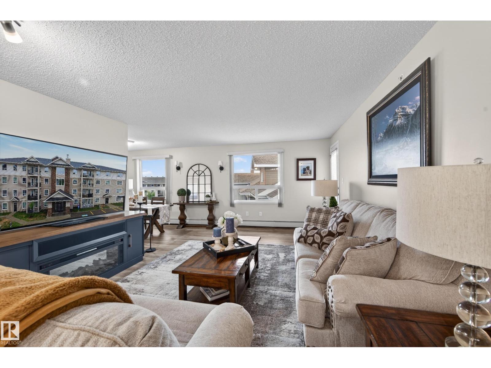 #2402 7343 SOUTH TERWILLEGAR DR NW - 28