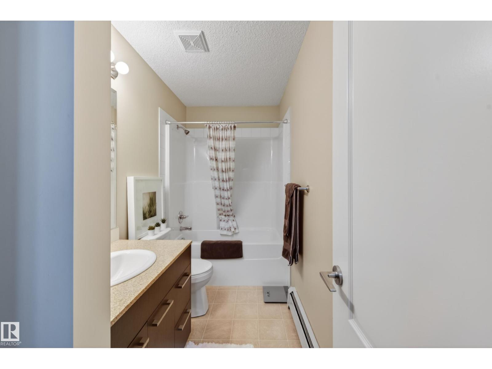#2402 7343 SOUTH TERWILLEGAR DR NW - 41