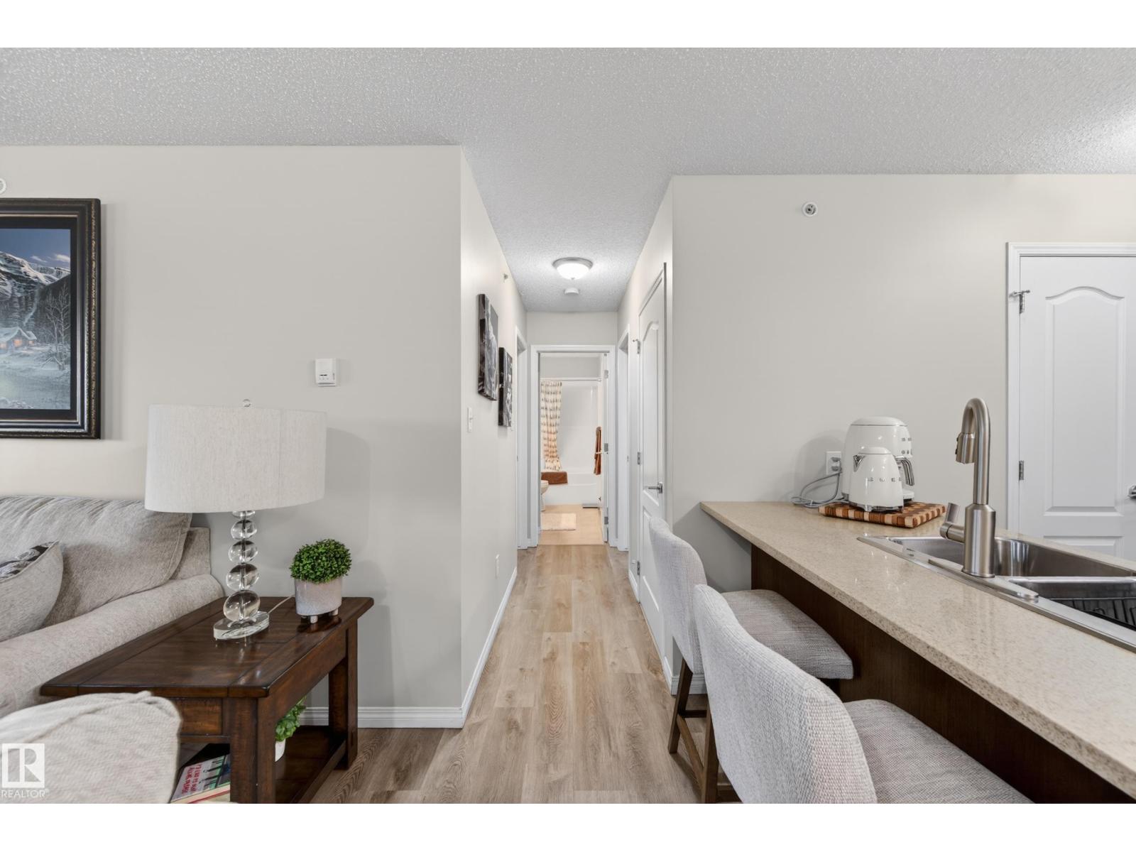 #2402 7343 SOUTH TERWILLEGAR DR NW - 39