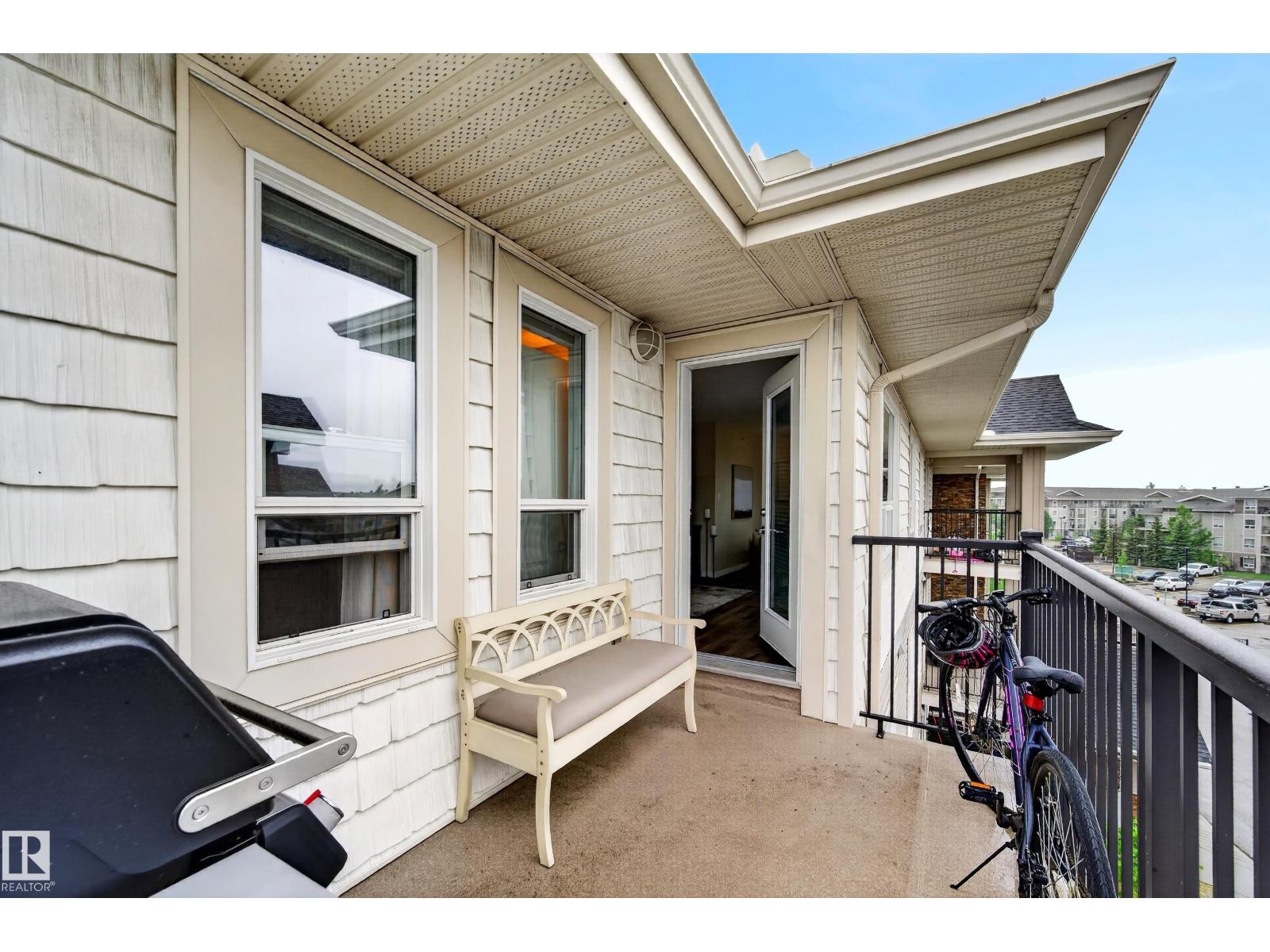 #2402 7343 SOUTH TERWILLEGAR DR NW - 57