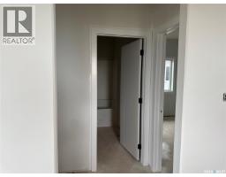 Laundry room - 492 Woolf Bend, Saskatoon, SK S7W1E4 Photo 11