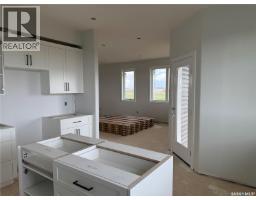 Family room - 492 Woolf Bend, Saskatoon, SK S7W1E4 Photo 10
