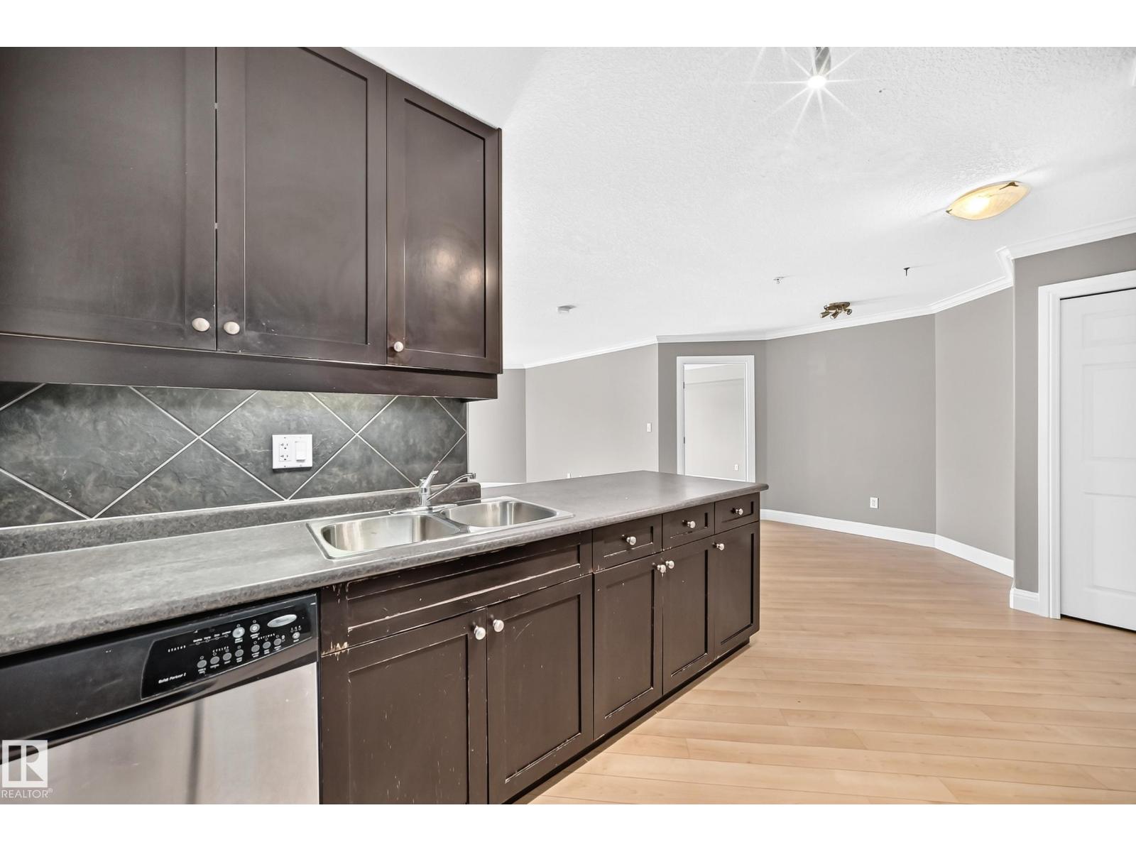 #202 14608 125 ST NW - 50