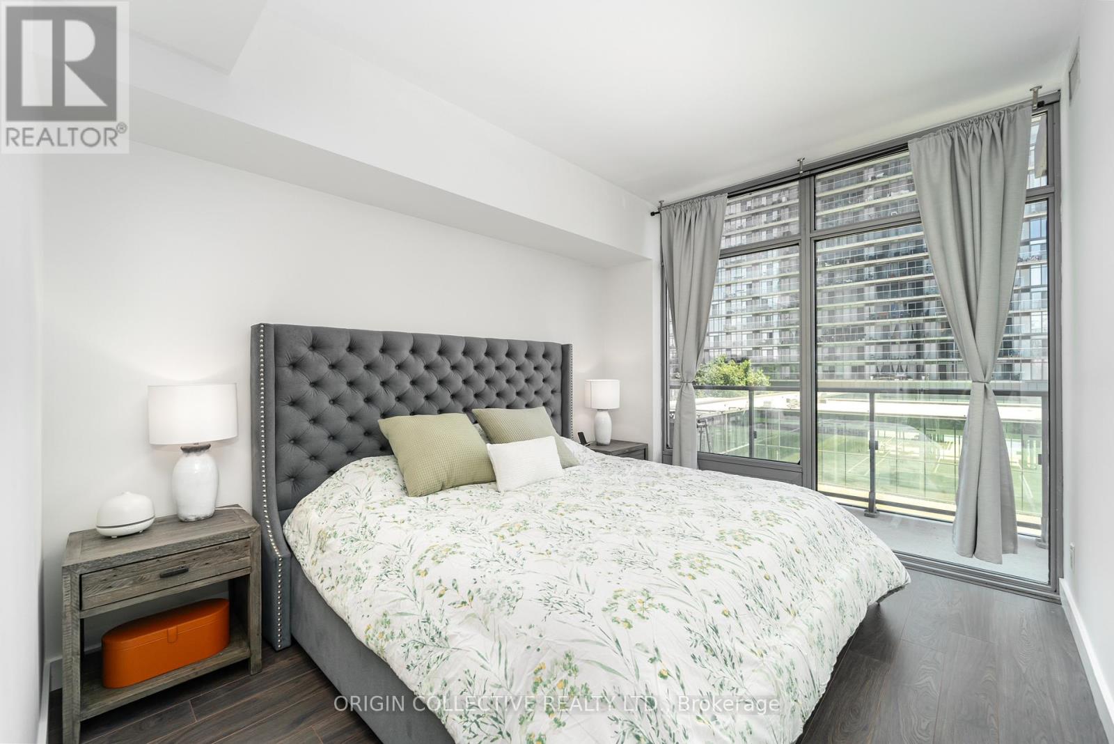 #302 105 THE QUEENSWAY AVENUE - 13
