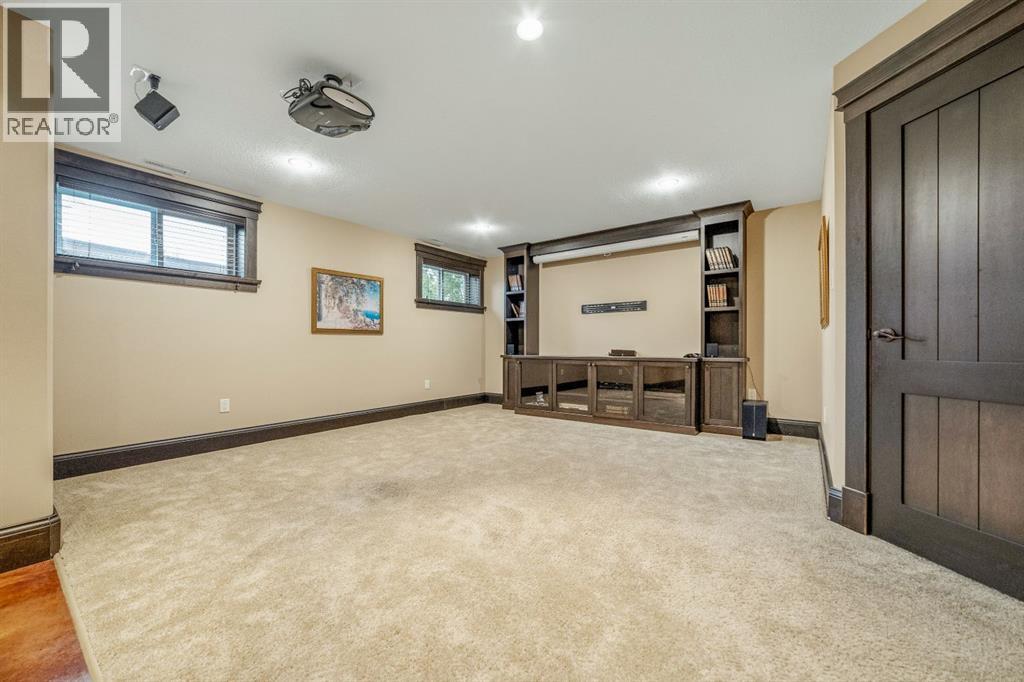 Dedicated family media room with projector and 100 inch screen