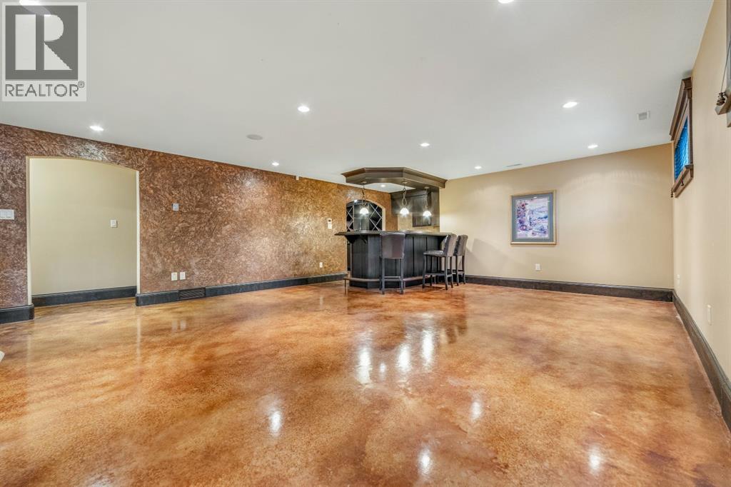 Very large games, exercise rumpus room with wet bar and walk thru wine pantry