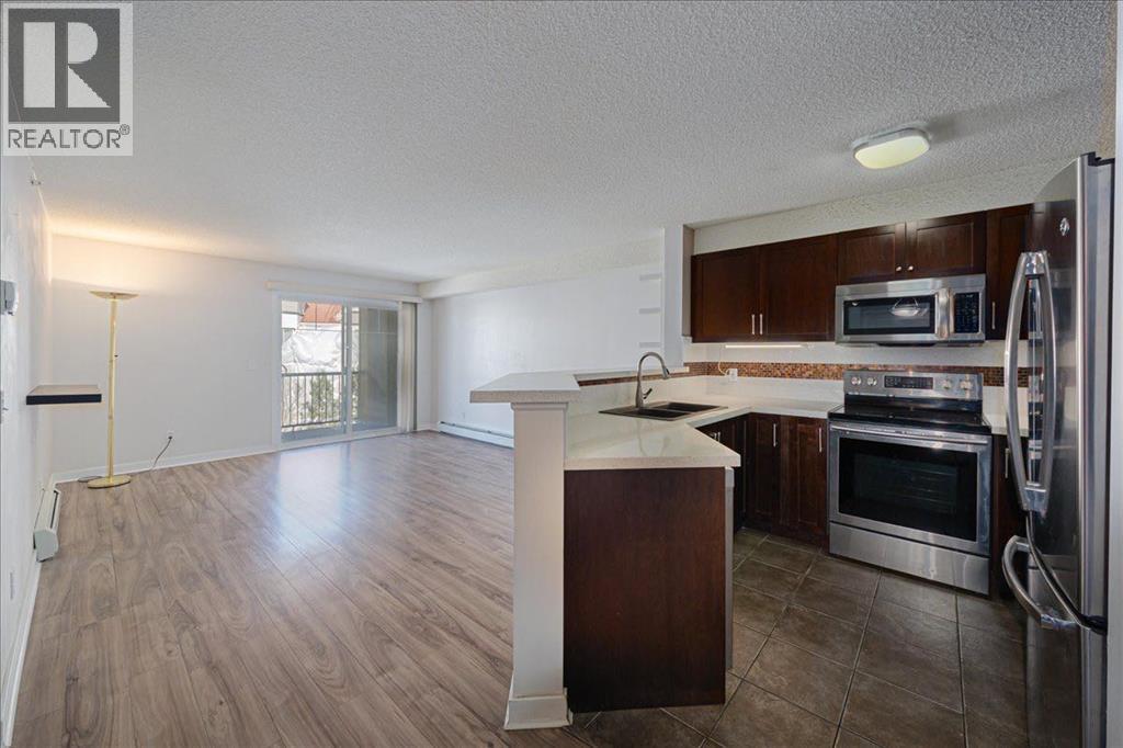 #1424 8810 Royal Birch Boulevard NW - 14