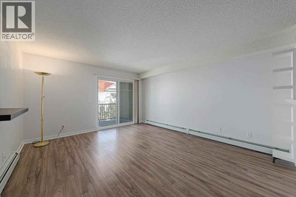 #1424 8810 Royal Birch Boulevard NW - 18